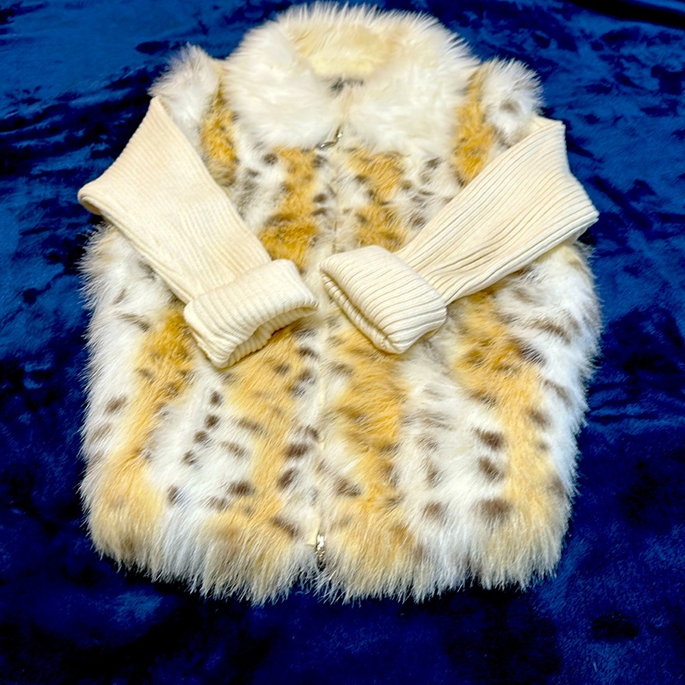Faux fur white and tan leopard print sweater